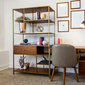 Decorated desk with chair in living room at The Graham at Southern Towers, Alexandria, VA, 22311