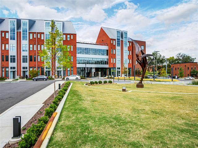 The Flats at Taylor Place exterior with green space - Nashville, TN