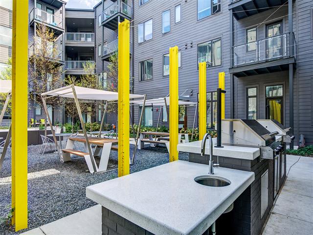 The Flats at Taylor Place outdoor cabanas and grill stations - Nashville, TN