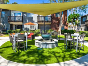 Apartments in Ontario CA - Expansive Courtyard at Encore Featuring Various Lounge Areas and Outdoor Amenities