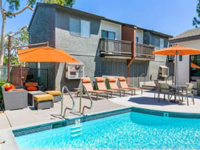 Apartments for Rent in Ontario CA - Sparkling Pool Featuring Various Lounge Areas
