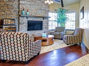 Community Lounge with Fire Place and lots of natural lighting
