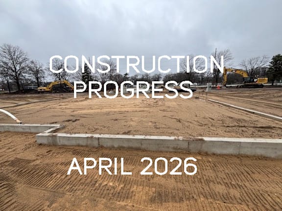 A construction site with the text "CONSTRUCTION PROGRESS APRIL 2026" overlaid on the image.