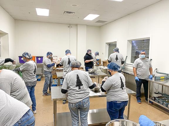a group of people working in a room