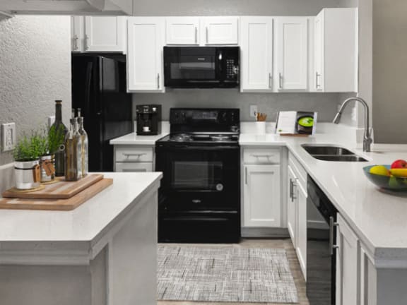 Kitchen with White Cabinets at Chapel View Apartments in Chapel Hill, NC