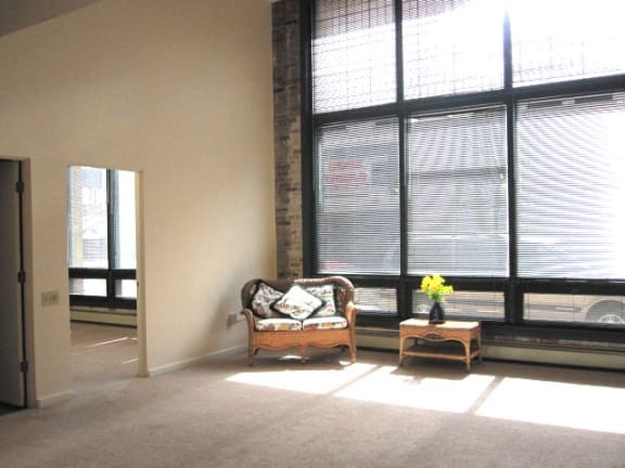 a room with a chair and a table in it