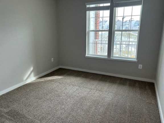 Comfortable Bedroom With Large Window at Poland Hill Senior Apartments, Chantilly, VA
