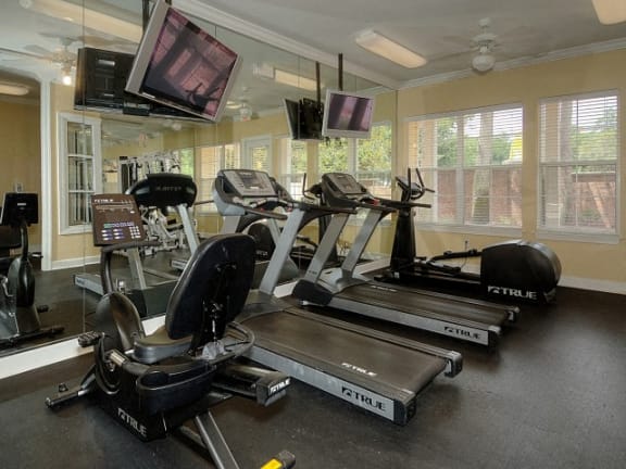 Interior Clubhouse Gym Fitness Center at Magnolia Place Apartment, Gainesville, FL, 32606