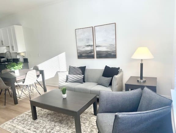 a living room with a couch and a table