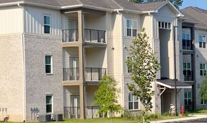 Apartment with Tree in Front at Arbours at Quincy, Florida, 32351