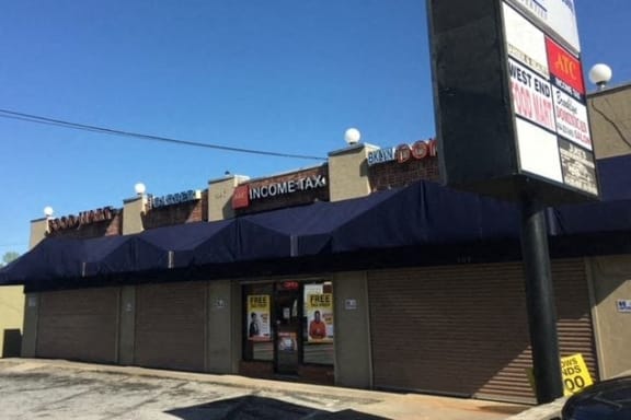 a building with a sign in front of it