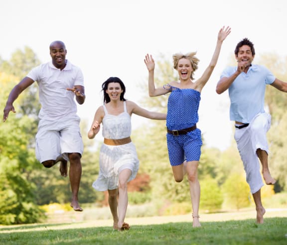 a group of people in a group exercise class