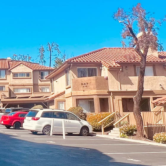 a parking lot in front of a building