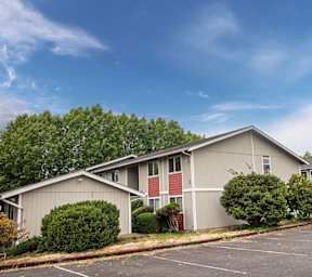 Apartment complex with multiple buildings and garages.