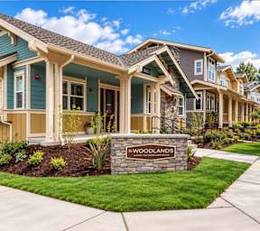 Apartment complex with multiple buildings and garages.