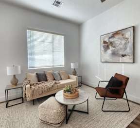 a living room with a couch and a coffee table at Zora Encanto, Arizona