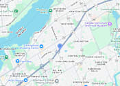 Thumbnail 3 of 3 - A map of a city with a blue pin in the middle.
