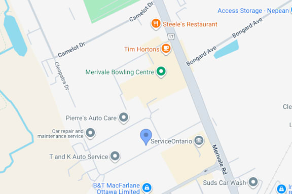 A map shows a street with various businesses and services such as a bowling alley, restaurants, and auto care centers.