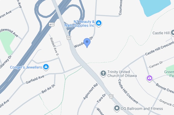 A map shows a section of a city with roads, buildings, and a church.