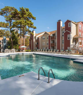Community Swimming Pool with Pool Furniture at Woodland Estates Apartments in Charlotte, NC-SMLAM.