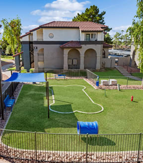 Community Dog Park with Agility Equipment at Stillwater Apartments in Glendale, AZ-SMLAM.
