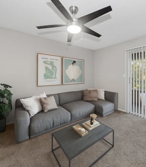Model Living Room with Carpet and Patio Accessibility at Walden Lake Apartments in Plant City, FL-SMLAM.