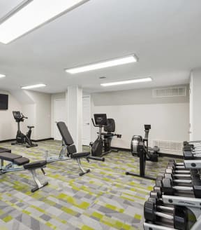 Community Fitness Center with Equipment at Parc at Creekside Apartments in Kansas City, MO-SMLAM.