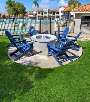 Fire pit in front of the community pool