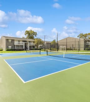 Tennis courts at Arbors at Orange Park Apartments in Orange Park, Florida.