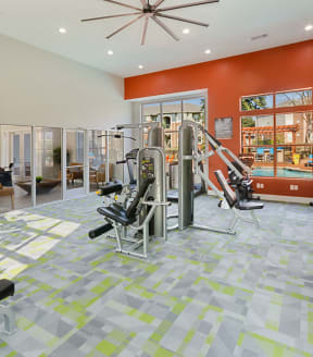 Fitness center at The Belmont at Duck Creek Apartments in Garland, TX.