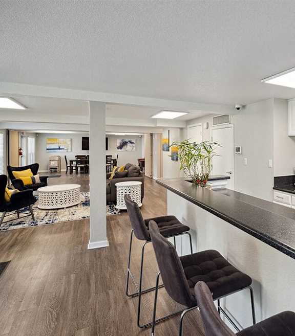 Modern Kitchen with bar area at Villages at Gateway, Denver, CO, 80239
