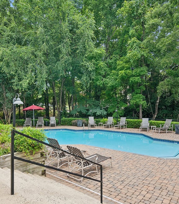 Community Swimming Pool with Pool Furniture at Park at Caterina Apartments located in Charlotte, NC-SMLAM.
