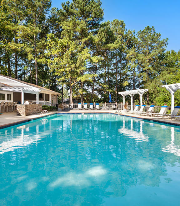 Community Swimming Pool with Pool Furniture at Paramont Apartments in Duluth, GA-SMLAM.