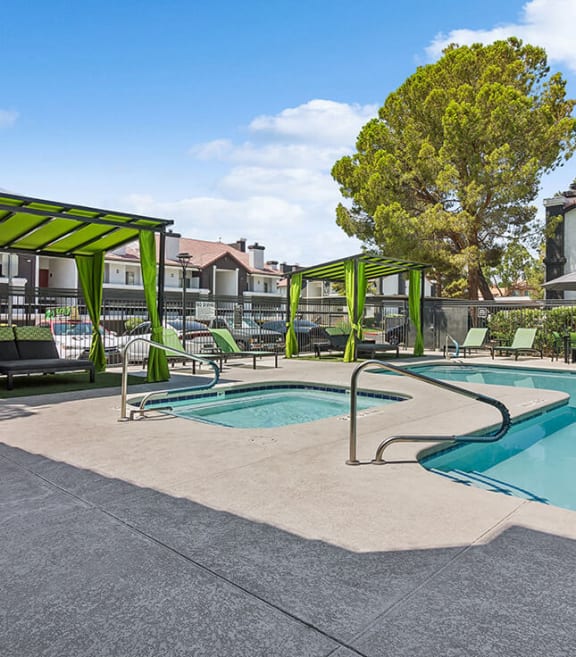 Community Swimming Pool with Pool Furniture at Meadow Ridge Apartments located in Las Vegas, NV-SMLAM.