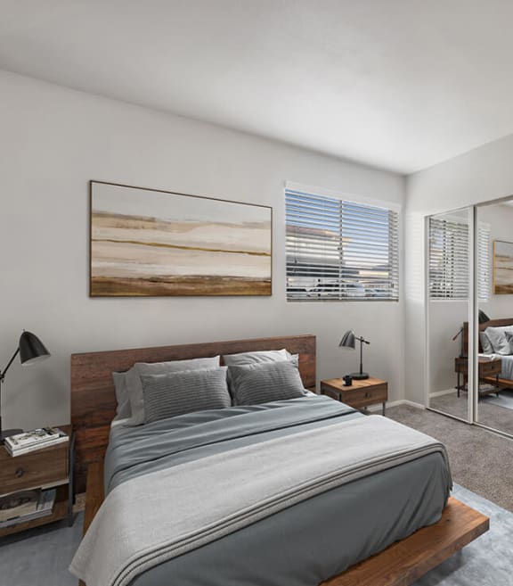 Model Bedroom with Carpet and Window View at Country Club Verandas Apartments located in Mesa, AZ-SMLAM.
