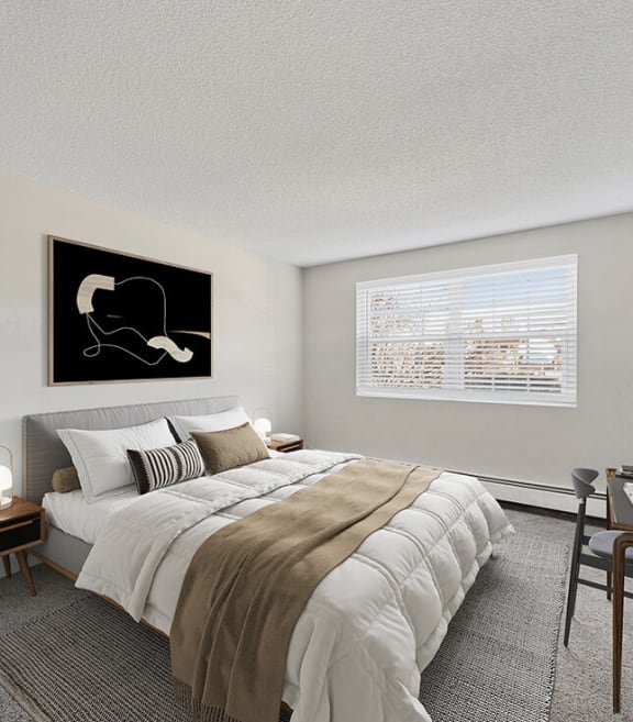 Model Bedroom with Carpet and Window View at Middlesex Apartments located in Billerica, MA-SMLAM.