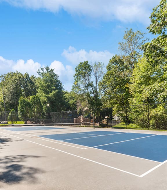 Community Pickleball Courts with Nets at Commons at Haynes Farm Apartments located in Shrewsbury, MA-SMLAM.