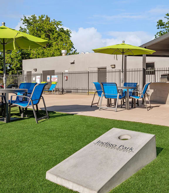 Outdoor Corn Hole Area at Indigo Park Apartments in Albuquerque, NM-SMLAM.