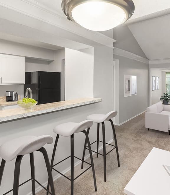 Model Kitchen Area at Cobblestone Apartments in Arlington, TX-SMLAM.