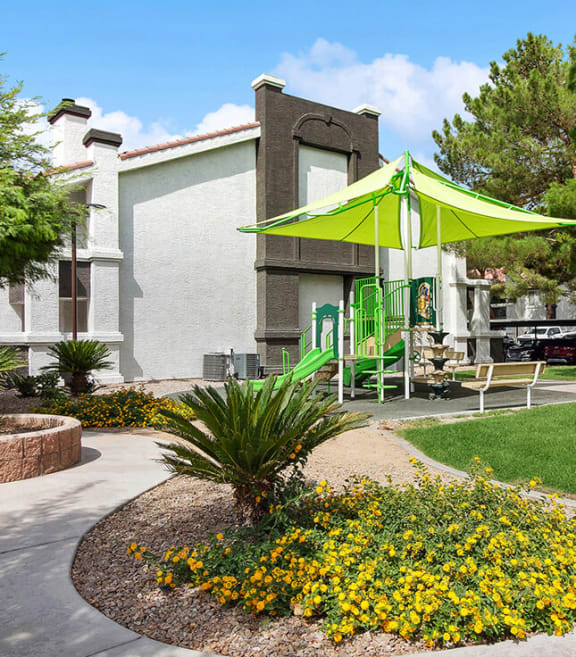 Community Playground and Landscape at Meadow Ridge Apartments located in Las Vegas, NV-SMLAM.