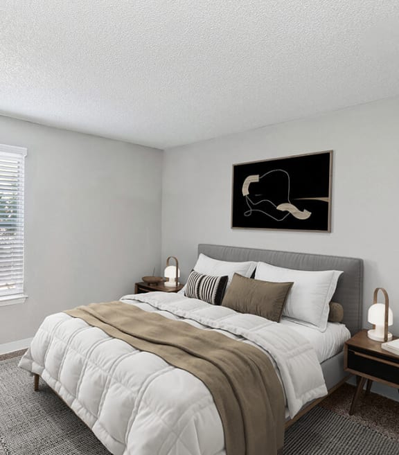 Model Bedroom with Carpet and Window View at Indigo Park Apartments in Albuquerque, NM-SMLAM.