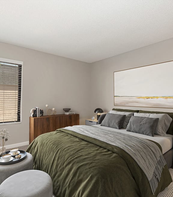 Model Bedroom with Carpet and Window View at Saratoga Ridge Apartments located in North Phoenix, AZ-SMLAM.