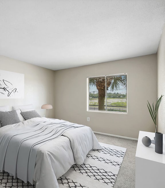 Model Bedroom with Carpet at Park at 7200 Apartments in Jacksonville, FL-SMLAM.