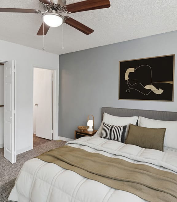 Model Bedroom with Carpet and Closet at Lakeside Casitas Apartments located in Tucson, AZ-SMLAM.
