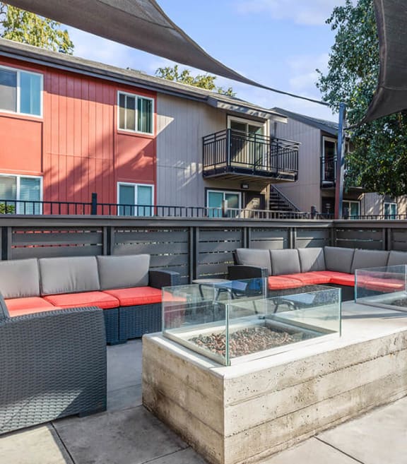 Community Fire Pit Area with Patio Furniture at The Archer Apartments in Sacramento, CA-SMLAM.