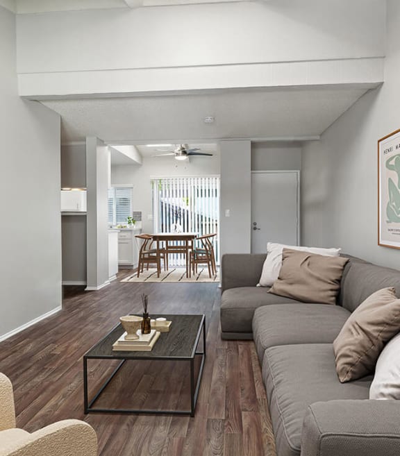 Model Living Room with Wood-Style Flooring at Colonnade at Fletcher Hills Apartments in El Cajon, CA-SMLAM.