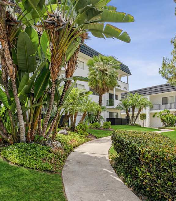 Exterior Community Building and Landscape at Palmilla Apartments located in San Diego, CA.