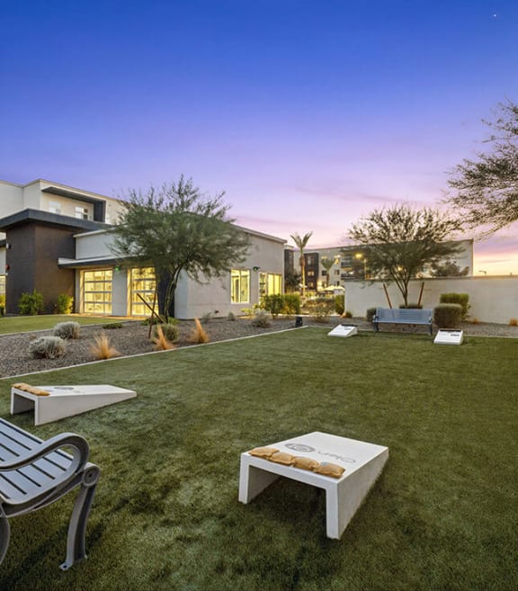 Outdoor Corn Hole Area at Glen 91 Apartments located in Glendale, AZ-SMLAM.