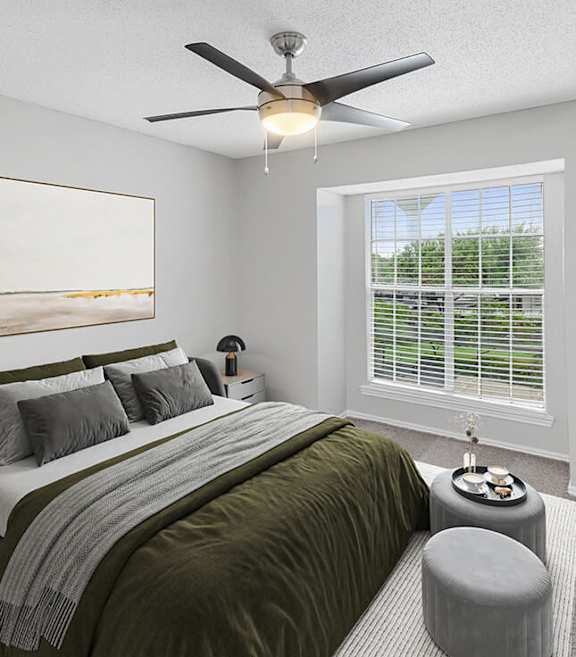Model Bedroom with Carpet at Cobblestone Apartments located in Arlington, TX-SMLAM.