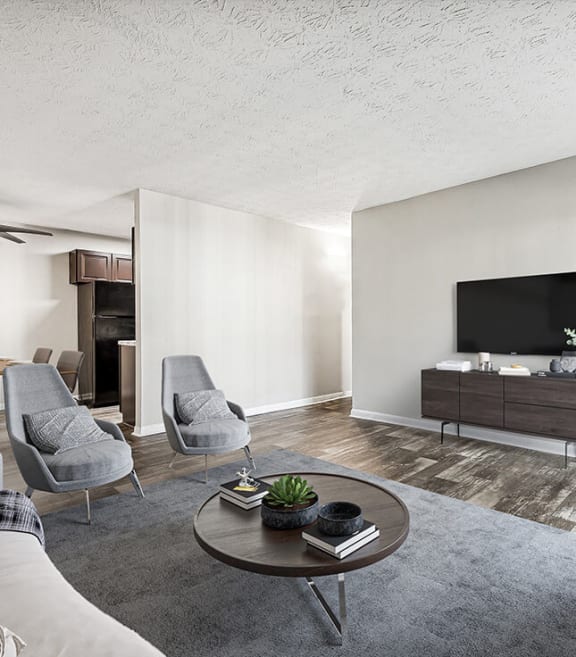 Model Living Room with Wood-Style Flooring at Paramont Apartments in Duluth, GA-SMLAM.